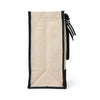 Side view of the Boutique Canvas Tote showing its gusset and black trim