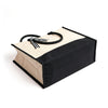 Bottom view of the Boutique Canvas Tote showing its black base