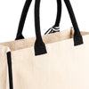Close-up of the black handle and attachment stitching on the Boutique Canvas Tote