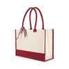 Angled view of the Boutique Canvas Tote with maroon trim and upright handles