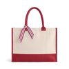 Front view of the Boutique Canvas Tote with maroon handles, trim and striped ribbon